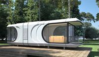 Maison capsule spatiale Apple préfabriquée moderne, cabine modulaire isolée et mobile pour les voyages en plein air et l'hébergement résidentiel