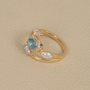 แหวนเพชรทรงโอวัลสีน้ำเงินแบบโอเพ่นริง ประดับเพชรแบบฮาโล ทองคำแท้ 14K แหวนเพชรแบบพันรอบ งานจิวเวลรี่ชั้นดี - Product Image 2