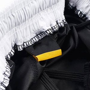 Shorts MMA personnalisés : Noir avec ceinture contrastante blanche et panneau interne de la jambe - Shorts d'entraînement respirants pour la lutte - Service OEM - Product Image 3