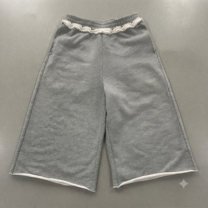 Shorts de survêtement pour homme en coton épais, coupe ample à jambe large, avec ceinture à bords bruts, style streetwear décontracté d'été - Product Image 1