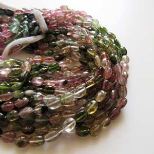 ลูกปัดทัวร์มาลีนสีชมพูเขียวธรรมชาติทรงรี เรียบเนียน รูปทรงแตงโม พลอยทัวร์มาลีนหลากสี ร้อยเป็นเส้น หินเม็ดเดี่ยว - Product Image 6