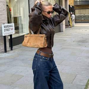 Nouvelle veste tendance pour femme en cuir véritable, respirante, coupe-vent, à col montant, manches longues et taille ajustée pour l'hiver - Product Image 2