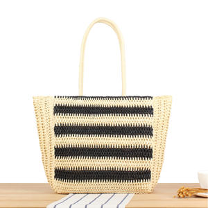 Define tu estilo de temporada con este clásico bolso de hilo natural, con correas tejidas profesionalmente y textura fina. - Product Image 6