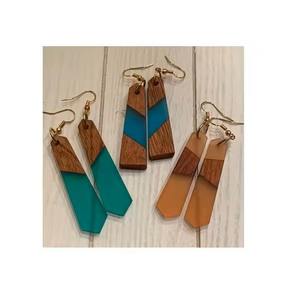 Boucles d'oreilles pendantes légères en résine époxy faites à la main, bijoux de mode tendance pour femmes, fournisseur en gros, export - Product Image 1