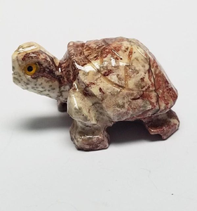 Small polished reddish-brown patterned <b>stone</b> turtle statuette with detailed shell carvings, available at wholesale prices. - Product Image 1