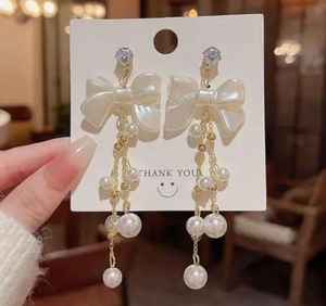 ต่างหูห้อยประดับมุกสีขาวรูปโบว์สไตล์เกาหลี ดีไซน์หรูหรา สำหรับผู้หญิง ราคาส่งถูก - Product Image 5