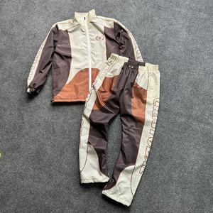 Ensemble coupe-vent en nylon avec logo personnalisé pour hommes Survêtement coupe-vent Veste et pantalon à fermeture éclair Deux Plus Size Solide Léger Automne - Product Image 1