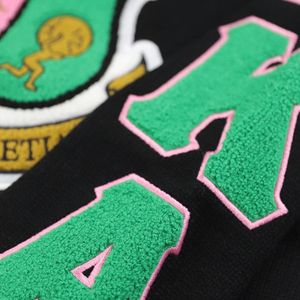 <b>Black</b> AKA V Neck Sweater With Pink Green Trim Embroidered Crest Pullover Knit <b>Top</b> Stylish Casual Apparel For Women - Product Image 5