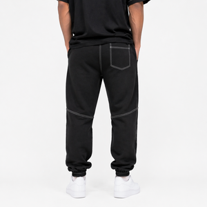 Pantalon de jogging baggy noir pour homme style streetwear hip-hop avec empiècements contrastants blancs et cordon de serrage - Product Image 2