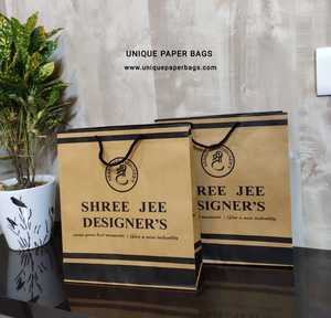 Bolsas de Papel Ecológicas al por Mayor, Bolsas de Embalaje con Logotipo Personalizado Impreso para Boutiques, Tiendas Minoristas y Tiendas de Regalos - Product Image 1