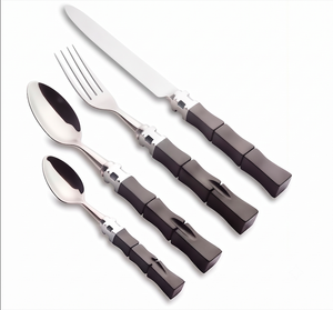 Juego de 4 cubiertos de acero inoxidable con elegante mango negro, perfecto para uso en restaurantes de hoteles elegantes. - Product Image 1