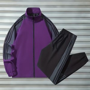 Conjunto deportivo de 2 piezas. Confeccionado con poliéster y spandex transpirables de primera calidad, con chaqueta con cremallera completa y pantalones con bolsillo con cremallera. - Product Image 1