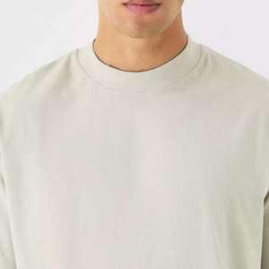 เสื้อยืดครอปแขนสั้นทรงหลวมสำหรับผู้ชาย ผ้าฝ้าย 100% ผลิตตามสั่ง พร้อมปักโลโก้ ผ้าแคนวาสคุณภาพสูง บริการ OEM - Product Image 4