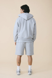 Sweat à capuche zippé pour homme en molleton de coton gris chiné, avec logo frontal, épaules tombantes et poche kangourou, style streetwear décontracté pour l'hiver - Product Image 3