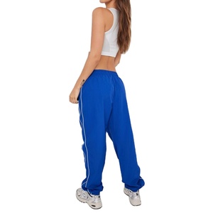 Chándal de poliéster con logotipo personalizado, chaqueta cortavientos para mujer y pantalones para correr, conjunto de chándal cortavientos 2026 - Product Image 3