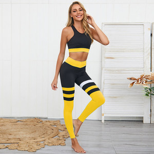 Ensemble de yoga 2 pièces color block noir et jaune, comprenant un crop top dos nageur et un legging taille haute sans couture, tenue d'entraînement longue - Product Image 1