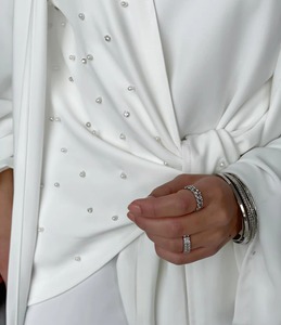 ชุดญิลบาบสีน้ำตาลช็อกโกแลตแบบเต็มตัว พร้อมเสื้อท่อนบนพลิ้วไหวและกระโปรงยาวระดับข้อเท้า สไตล์ลำลอง ใส่คู่กับรองเท้าผ้าใบได้อย่างลงตัว - Product Image 6