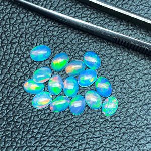 พลอยออปเพอร์จากเอธิโอเปียธรรมชาติขนาด4x5มม. พลอยทรงวงรีเรียบขัดมันหลวมสำหรับทำเครื่องประดับ - Product Image 1