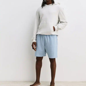 กางเกงขาสั้นผู้ชายลายปักแบบใหม่สำหรับฤดูร้อน เป็นมิตรกับสิ่งแวดล้อม ใช้งานได้หลากหลาย สวมใส่สบาย ระบายอากาศได้ดี เหมาะสำหรับใส่เล่นกีฬาที่บ้าน ทรงหลวม สวมใส่สบายๆ - Product Image 3