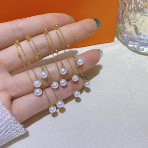 ต่างหูมุกน้ำจืดทรงกลม G18 K ทอง 10-11 มม. แสงเงางาม ดีไซน์เรียบง่ายสำหรับผู้หญิง - Product Image 4