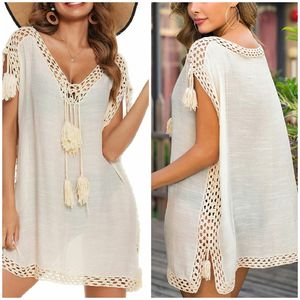 Vestido corto tipo pareo con cuello en V y borlas de ganchillo estilo bohemio para mujer. La silueta holgada garantiza comodidad y flujo de aire. - Product Image 3