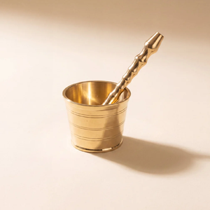 Heavy duty brass <b>mortar</b> <b>pestle</b> set with wide rim and rounded body for easy crushing, available at wholesale prices. - Product Image 2