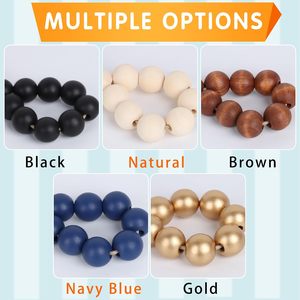 Anneau de serviette personnalisé en perles de bois bleu marine avec pompon en jute |   Serviette de table bohème écologique et durable pour mariage côtier de Noël - Product Image 2