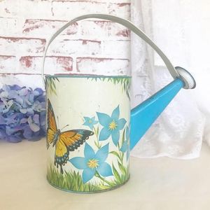 Elegante regadera metálica con diseños brillantes impresos en esmalte, ideal para decoración de interiores, jardinería y riego de plantas al aire libre. - Product Image 6