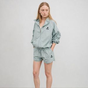 Comfortable <b>Women</b> <b>Windbreaker</b> Short Set Designed With Breathable Fabric For Maximum Mobility And Style Premium Quality - Product Image 1