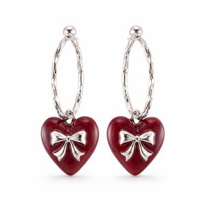 Pendientes colgantes con forma de corazón con colgante de resina roja y lazo plateado para mujer, joyería de estilo romántico - Product Image 1