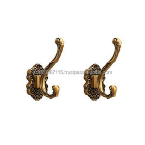 Wall mounted brass wall <b>hooks</b> provide elegant solution for organizing coats <b>towels</b> accessories efficiently in home spaces - Product Image 4