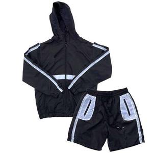 Conjunto Deportivo para Hombre, Chaqueta Cortavientos con Capucha Negra y Pantalones Cortos, Color Sólido, Secado Rápido, Tejido de Poliéster, Ropa de Primavera - Product Image 1