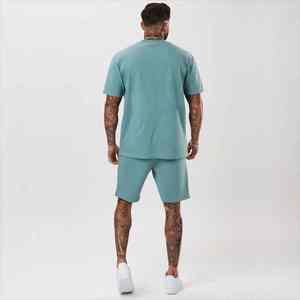 ชุดกีฬาฤดูร้อนแบบสองชิ้นสำหรับผู้ชาย ปรับแต่งได้ เสื้อแขนสั้นระบายอากาศและกางเกงขาสั้น ชุดกีฬากลางแจ้ง - Product Image 4