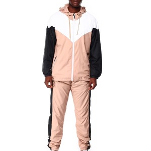 Conjuntos de 2 Piezas de Chaqueta Cortavientos y Pantalones Deportivos de Alta Calidad con Logotipo Personalizado OEM/ODM, Traje Cortavientos con Cierre para la Venta - Product Image 1