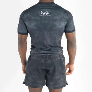 ชุดเสื้อรัดกล้ามเนื้อแขนสั้นและกางเกงขาสั้นสำหรับผู้ชาย สีเขียวเข้มขอบสีส้ม สำหรับออกกำลังกาย ฟิตเนส เล่นกีฬา - Product Image 6