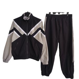 Ensemble tendance de survêtement pour homme avec logo personnalisé, veste d'échauffement et pantalon de jogging en nylon, coupe-vent personnalisé pour homme, logo surdimensionné, patchwork, salle de sport - Product Image 1