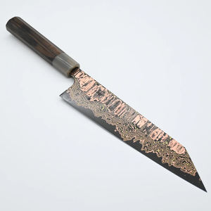 Cuchillo utilitario de cobre damasco hecho a mano por un diseñador, con agarre equilibrado para cortar en la cocina y preparar alimentos a diario. - Product Image 1