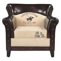 Fauteuil Chesterfield traditionnel en cuir véritable brun de qualité supérieure avec dossier capitonné, accoudoirs roulés et pieds en bois massif