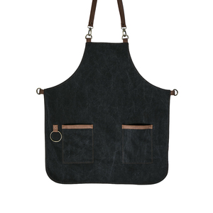 Capa de Peluquería de Lona Resistente con Ribete de Cuero y Bolsillos para Uso en Salón de Belleza - Product Image 1