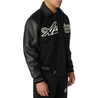 Blouson bomber noir pour homme Avirex, manches en cuir véritable, logo brodé, fermeture éclair coupe-vent, col rabattable, toile