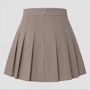 Jupe plissée mini pour femme, couleur unie, taille élastique, respirante, en polyester, à porter en toutes saisons - Product Image 2