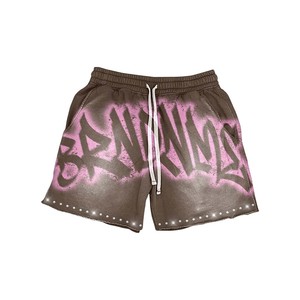 Shorts femme en coton French Terry 280 GSM, effet délavé, noir, vert fluo, imprimé graffiti, logo personnalisé DTG et impression en relief. - Product Image 4
