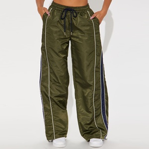 กางเกงวอร์มลำลองสำหรับผู้หญิงที่มีสไตล์ พร้อมแถบข้างตัดสีและซิปตกแต่ง กางเกงและกางเกงขายาวสำหรับผู้ชาย - Product Image 5