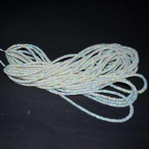 Cuentas de piedras preciosas de Rondelle lisas de ópalo etíope llamativo Natural de 3mm y 4mm calidad AAA Multi Fire Welo Opal por mayor proveedor de cuentas - Product Image 2