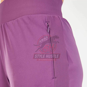 Pantalones de chándal acampanados para mujer, tallas grandes, ajuste regular, de invierno, cortavientos, ecológicos, de secado rápido, novedad 2026 al por mayor - Product Image 6