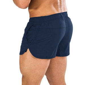 Shorts de sport gris uni coupe-vent à séchage rapide pour homme avec poches, taille élastique, longueur mi-cuisse, en toile de coton - Product Image 5