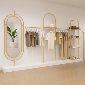 Exhibidor de Ropa de <span class=keywords><strong>Metal</strong></span> Dorado Personalizado para Tiendas, Exhibidor de Ropa de Acero Inoxidable para Pared - Product Image 1