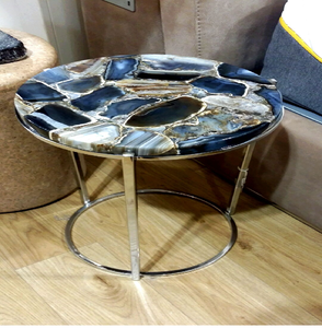 Une table moderne à plateau circulaire en verre, ornée de pierres de rivière naturelles et de galets suspendus dans de la résine transparente, est proposée à prix de gros. - Product Image 1