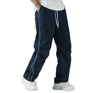 Pantalones acampanados personalizados con servicio OEM, precio al por mayor, pantalones de chándal de pierna recta, pantalones acampanados holgados de nailon en blanco de poliéster para hombre - Product Image 1