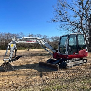 Mini-excavatrice Takeuchi TB235-2 efficace offrant une puissance exceptionnelle, une précision et une consommation de carburant réduite. - Product Image 1